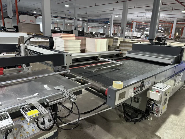 Packaging equipment and stacked paperboard